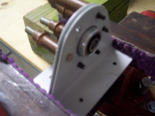 Drilling rivet holes for main bearing