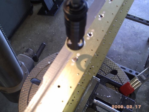 Using a screw head as a guage for depth.
