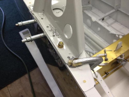 Clamped in place with one hole drilled and bolt installed and tightened