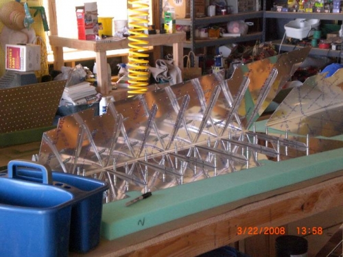 Stiffners are cleco'd into the right elevator.