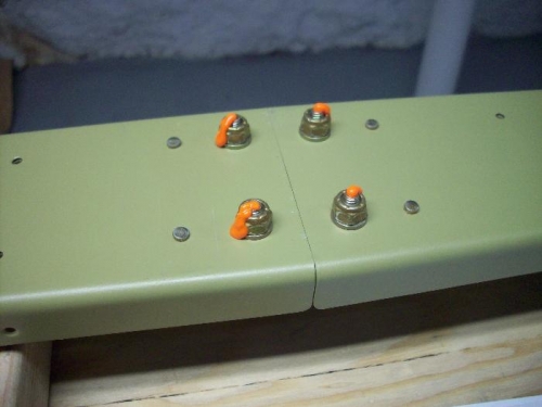 Torqued nuts to 25 in lb, then applied torque seal.