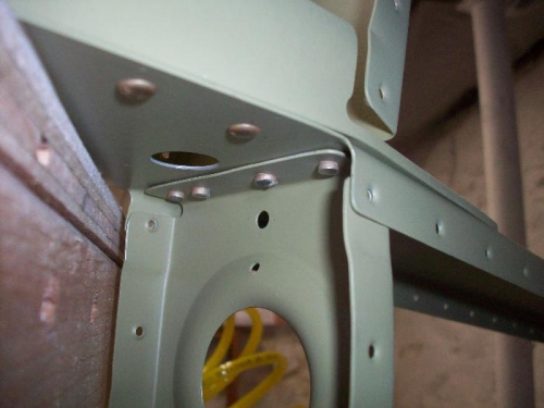 Drilled out the second rivet from the right.