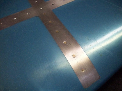 First crack at riveting the HS skin and HS-707.  didn't turn out too bad.