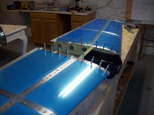 Bottom side of HS riveted, except for outer edges.