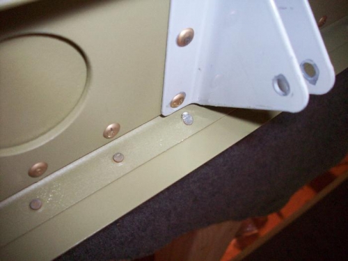 Riveting the rear spar, I'll need to drill out two of these that I bent over.