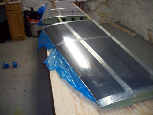 Peeling off the blue plastic.  Not sure if I'll be so aggressive with the scotchbrite on the next assy