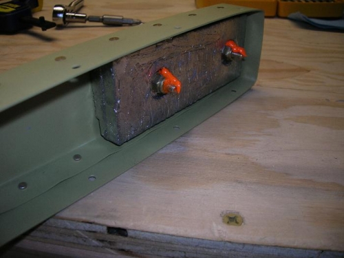 Lead counterweight in top of rudder.  Torque sealed in place.