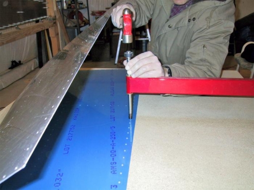 Dimpling the skin with the Avery C-frame. This is a great tool.