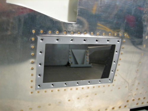 Attachment ring, riveted to the fuselage skin.