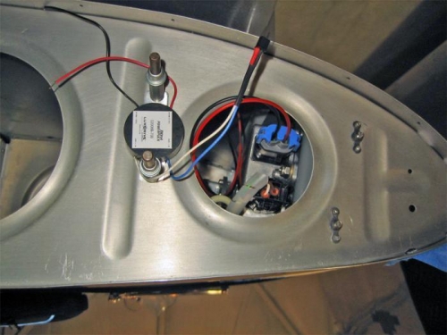 Power puck for the LED nav light, mounted on the end rib.