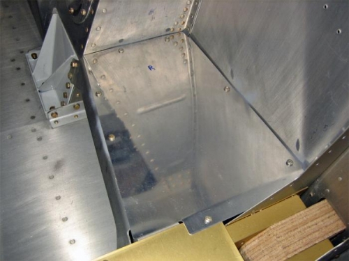 The right mid-cabin cover, attached with #8 screws.