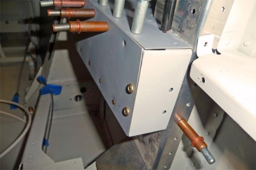 The upper-left corner of the aft side of the switch panel, after cosmetic improvements.