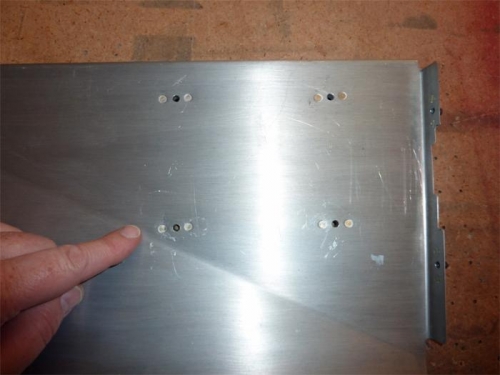 These four nutplates will attach the DVR unit to the sidewall of the baggage compartment.