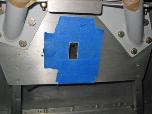 Rectangular switch hole for the rear cockpit map light.