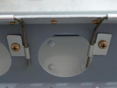 The flap hinge pins are held in these keepers, with nutplates underneath.
