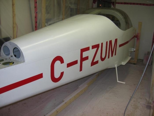 Fuselage paint masking removed