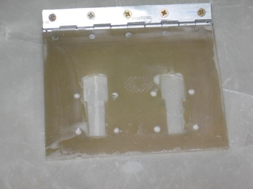 Oil filler door latches removed, inner and outer face sanded and micro applied