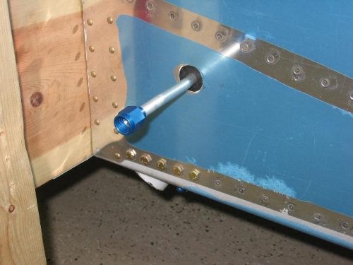 AN fittings installed on the fuel line running from the main fuel tank