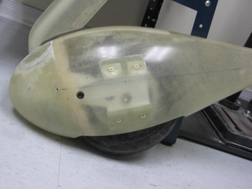 Wheel fairing aft section screw hole doubler added