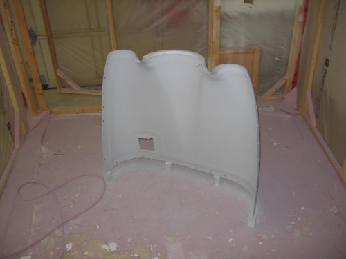 Upper engine cowling primed