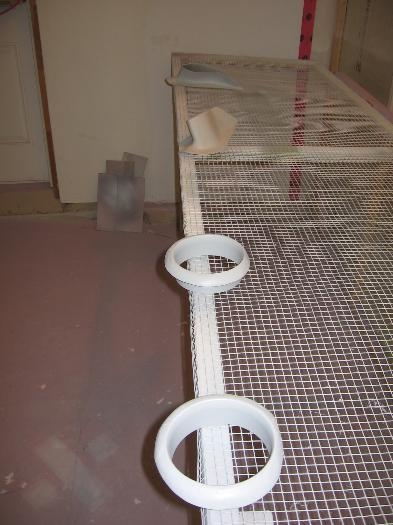 Engine cooling air intake rings and main gear leg upper intersection fairings primed