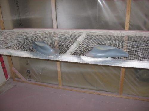 Main gear leg upper intersection fairings UV blocker applied