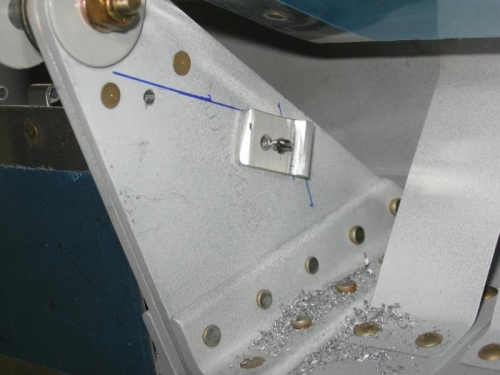 Aileron up stop fabricated and match drilled