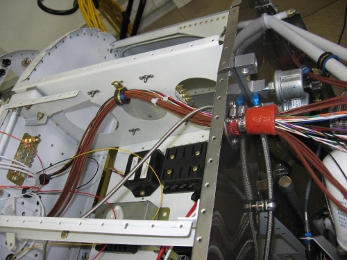 Engine harness support clamping and firewall pass through installed