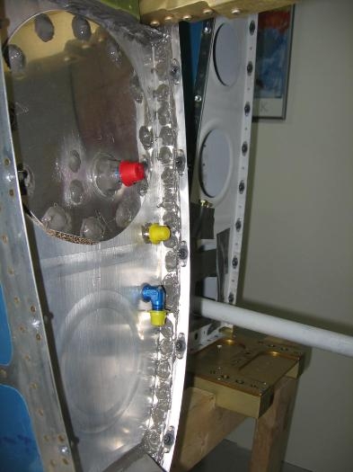 Wing root fairing anchor nuts along the leading edge