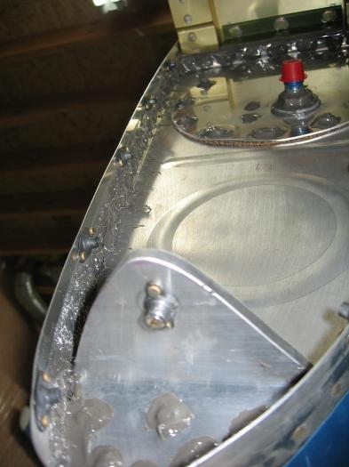 Anchor nut installed on the forward inboard tank support bracket