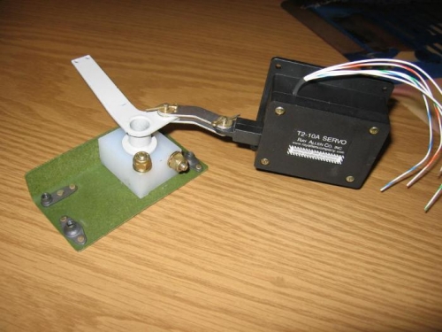 Aileron trim bracket, crank and actuator assembled