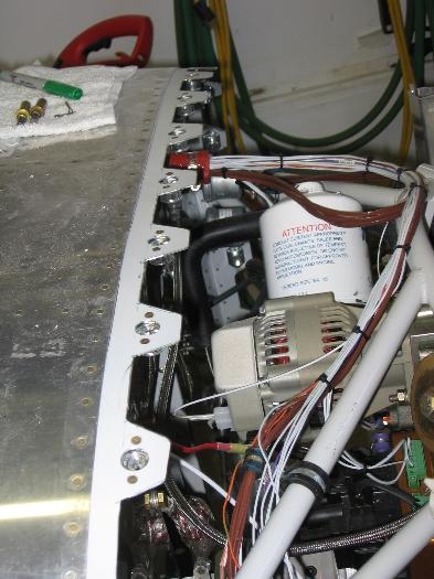 Cowling quarter turn fastener retainer strips scallopped and installed