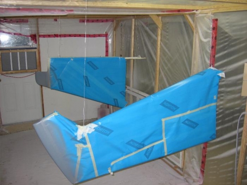 Rudder and vertical stabilizer masked and composite UV barrier applied