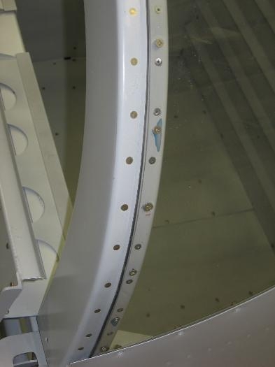 Aft cabin window retaining screw loctite added