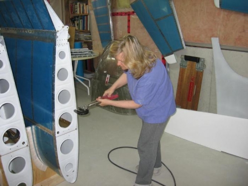 Dimpling the wing tip skin