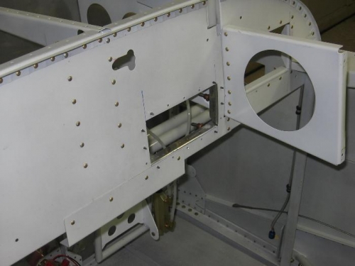 Subpanel tray pass through opening cut