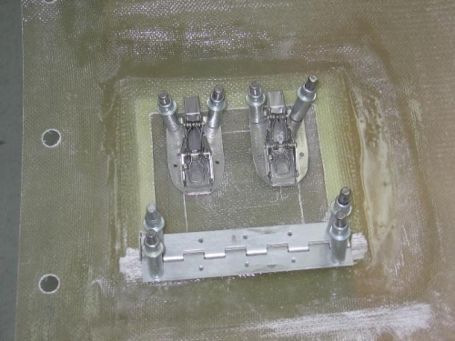 Upper cowling oil filler door hinges drilled