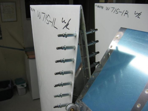 Wing tip fairing end rib fitting and drilling
