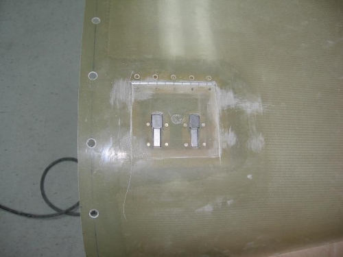 Upper cowling oil filler door installation completed