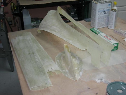 Main gear leg fairings, nose gear leg intersection fairing and HS to VS fairing sanded after micro
