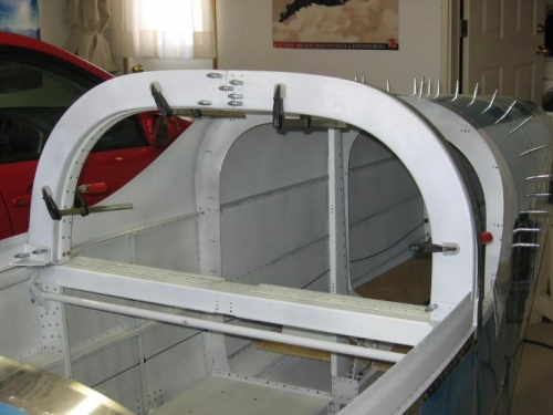 F-631A canopy aft frame repositioned to contact the canopy and splice plate match drilled