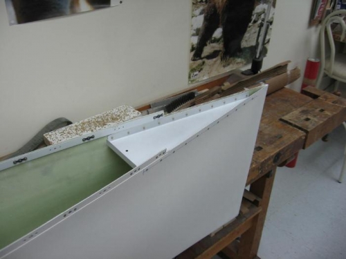 Wing tip fairing rib riveted on