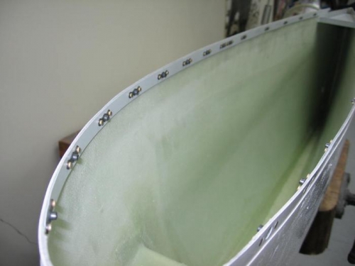 Wing tip fairing anchor nuts riveted on