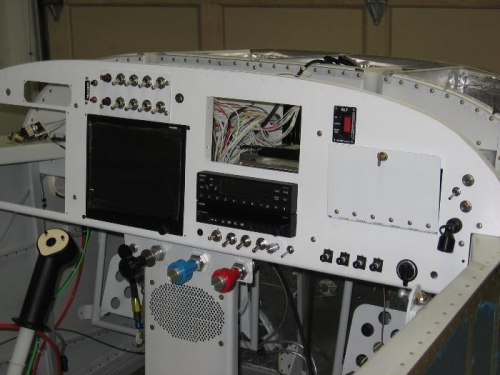 Instrument panel post paint repopulation