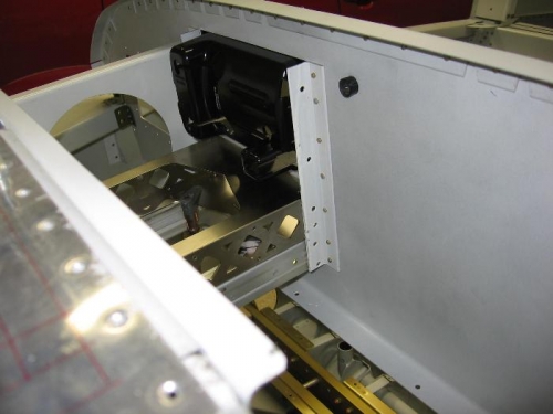 Instrument panel radio tray support angles riveted on