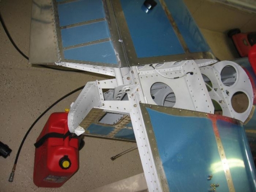 Elevator trim wiring routed from the trim servo to bulkhead disconnect