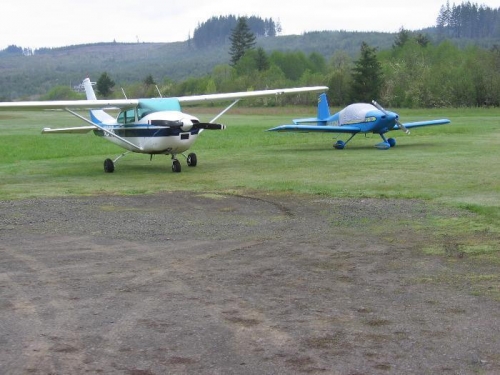 Van's RV-6A parked at Vernonia Airport with a C-182