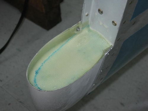 Stabilizer tip fairing fiberglassing