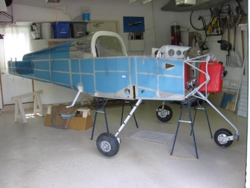 Fuselage leveled laterally and longitudinally clear of the ground