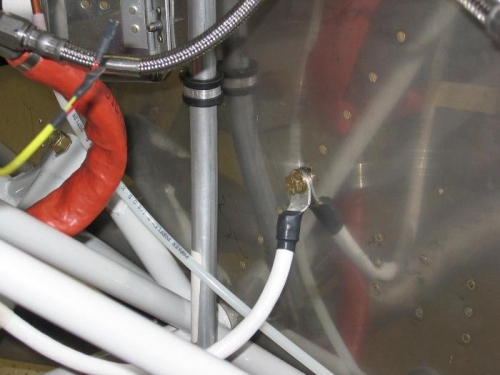 Engine crankcase to firewall ground cable